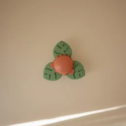 Mushie Spinner sensoryczny z przyssawką - Dino