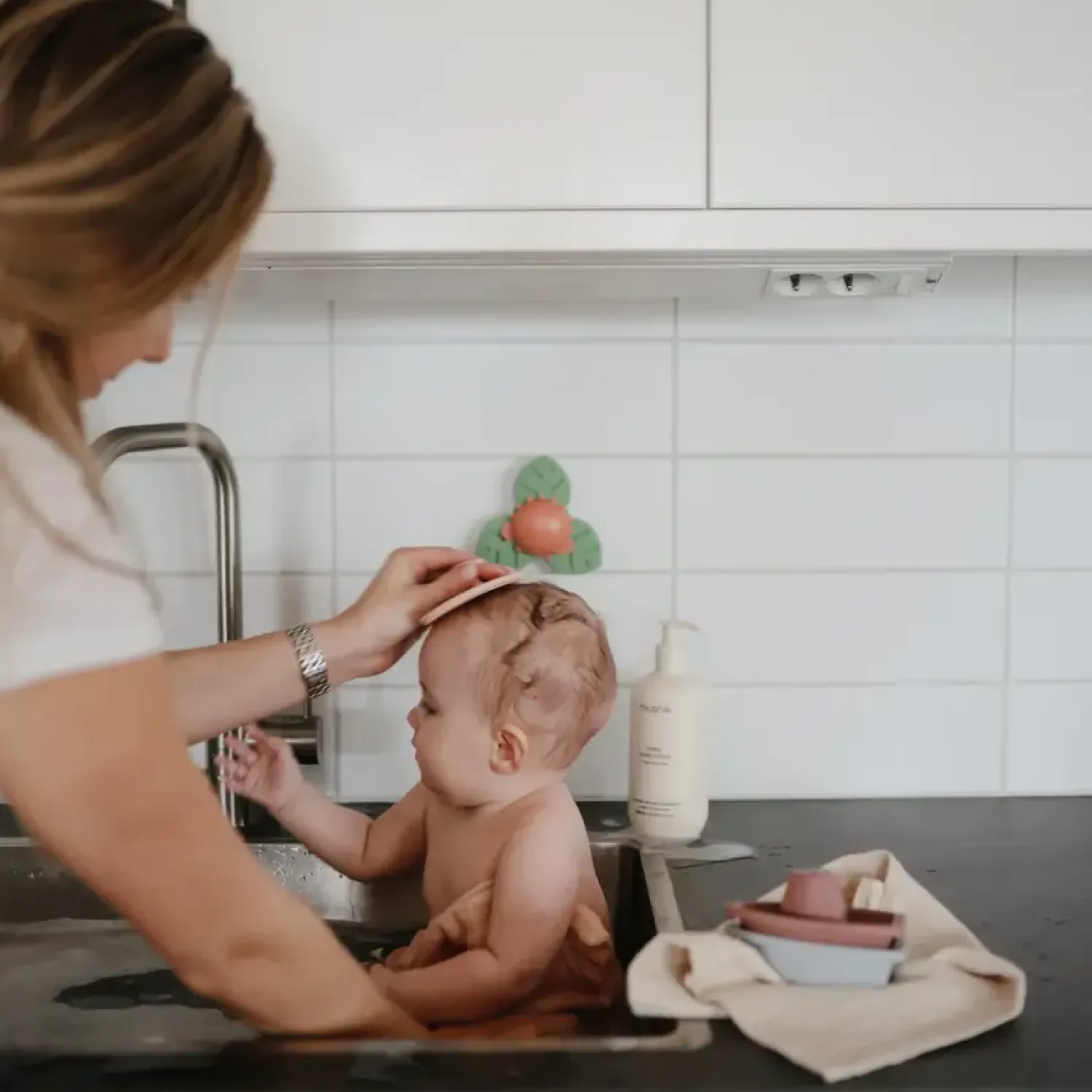 Mushie Spinner sensoryczny z przyssawką - Dino