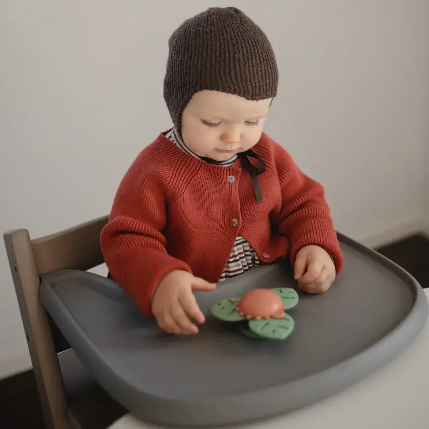 Mushie Spinner sensoryczny z przyssawką - Dino